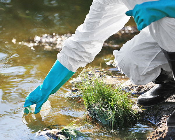 Collecting river water through a flask