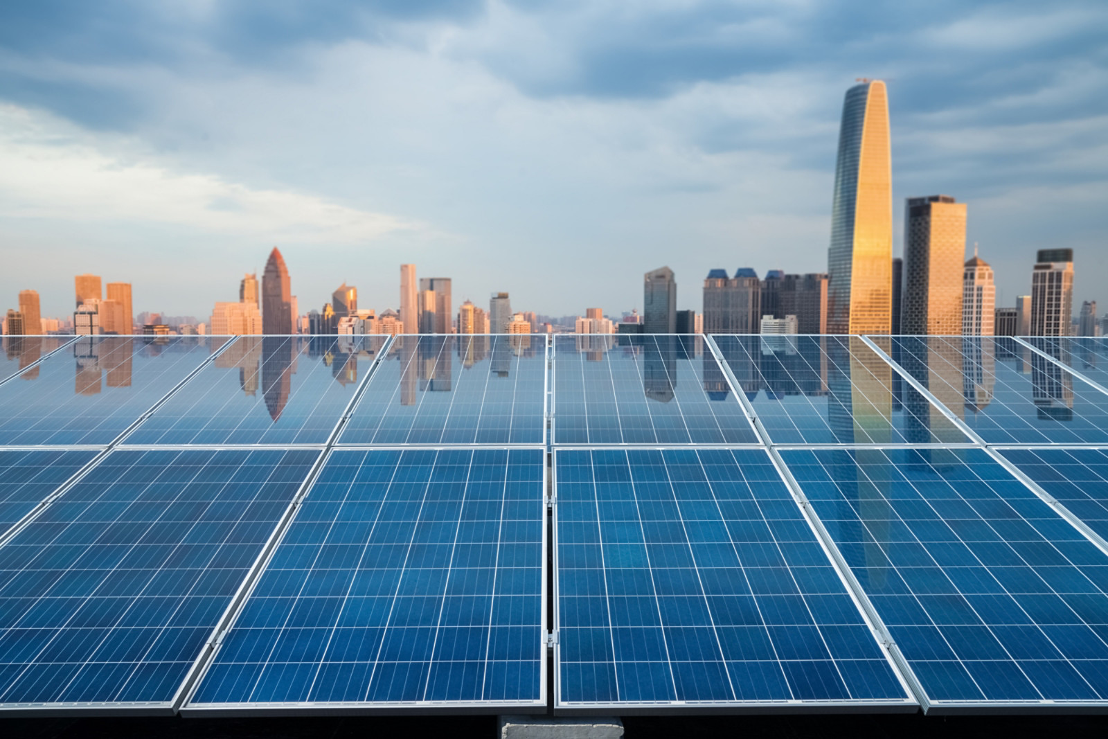 beautiful city twilight reflected on the solar energy panels