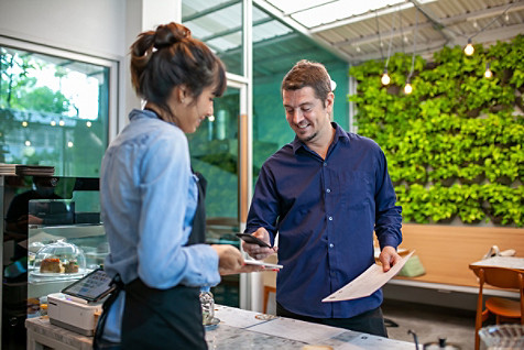 Customer use mobile phone scanning QR code for pay in cafe, Customer paying with qr code on smartphone., Customer use mobile phone scanning QR code for pay in cafe, Cust