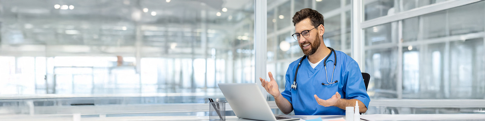 A doctor having a online meeting on laptop