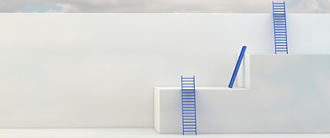 Ladders are placed on the white walls