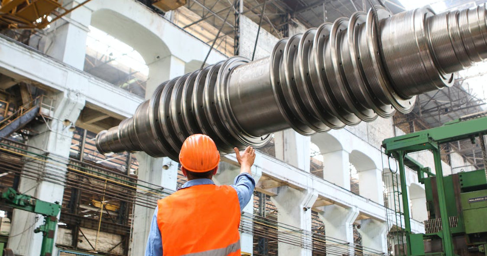 Man beside heavy machinery