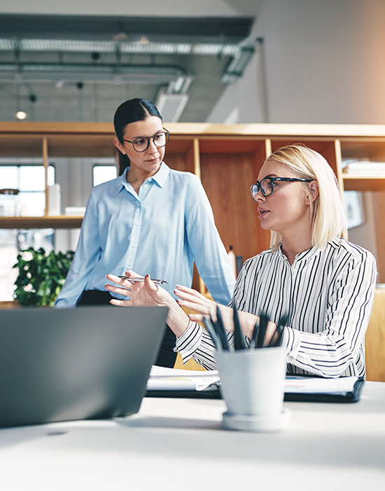 Two women sharing ideas