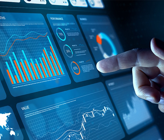 a dashboard with charts and a finger pointing to it
