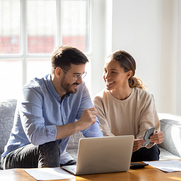 Three persons were discussing with some documents