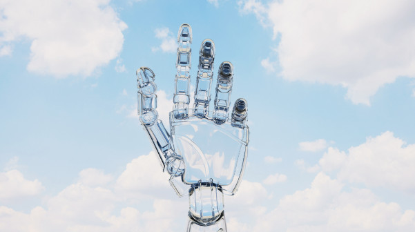 A see through robotic hand over cloud in the sky.