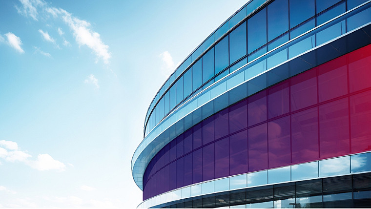 A Close-up of a Hispanic Electrician Working on a Circuit Board