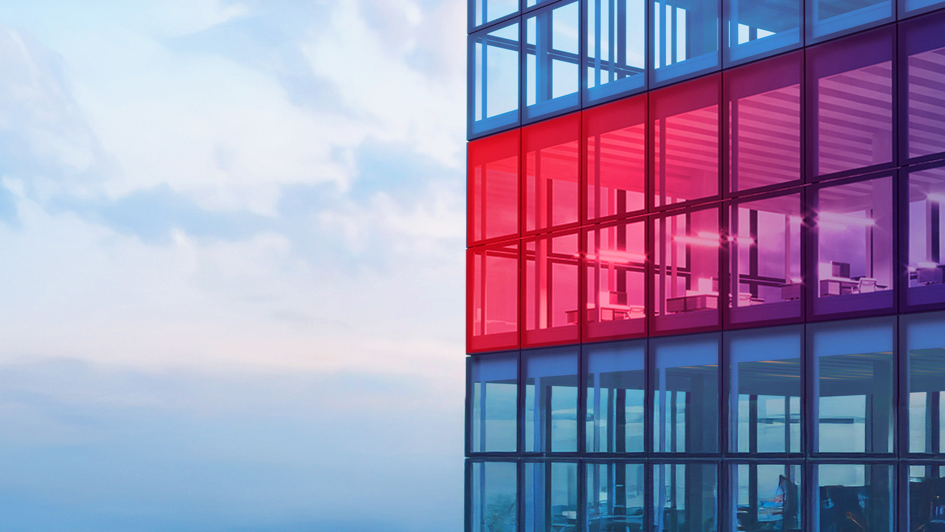 building having blue and red colored windows