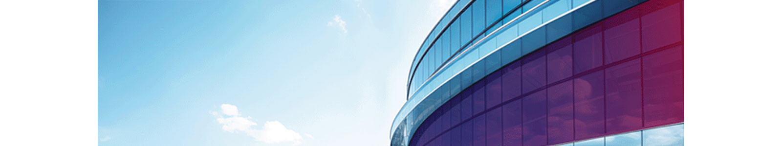 A modern building with curved glass architecture