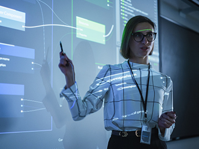 Young Female Professor Explaining Big Data and Artificial Intelligence