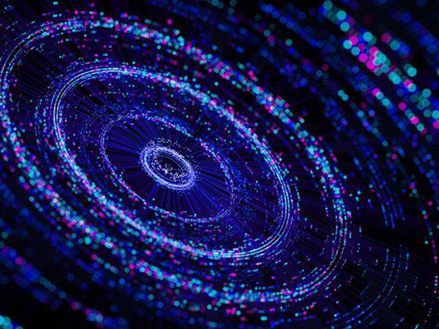 A circular arrangement of blue and purple dots creating a vibrant.