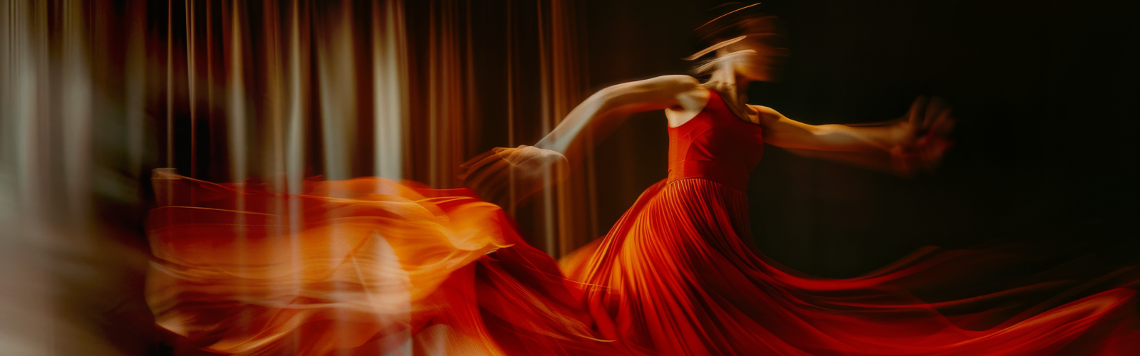 alt text within 10 words  1:16 PM Dancer in red dress spinning with motion blur