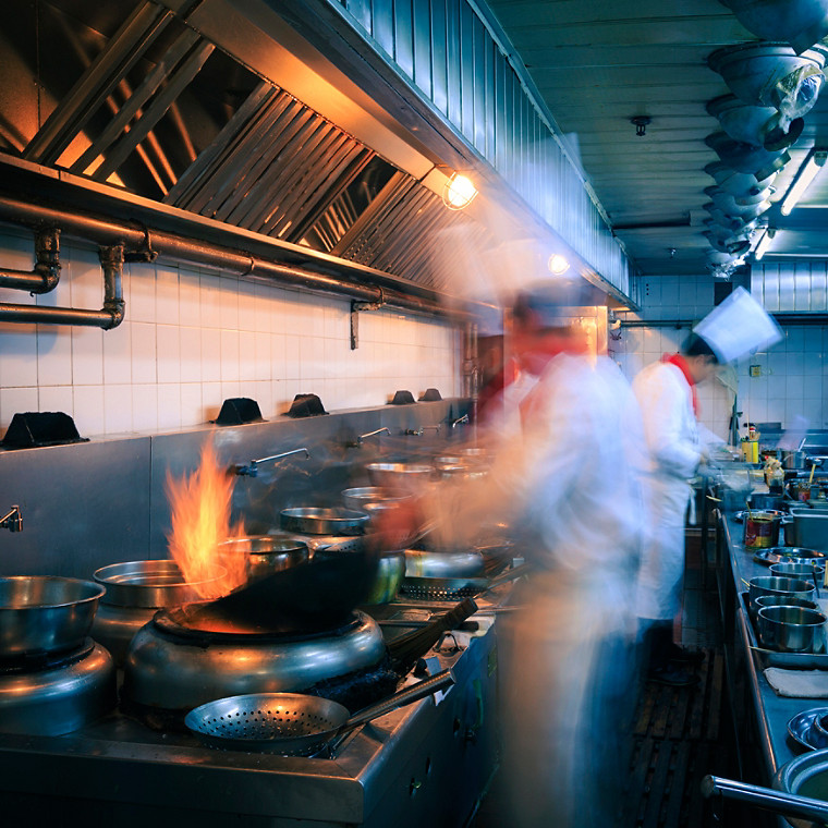 Chefs working in a commercial kitchen