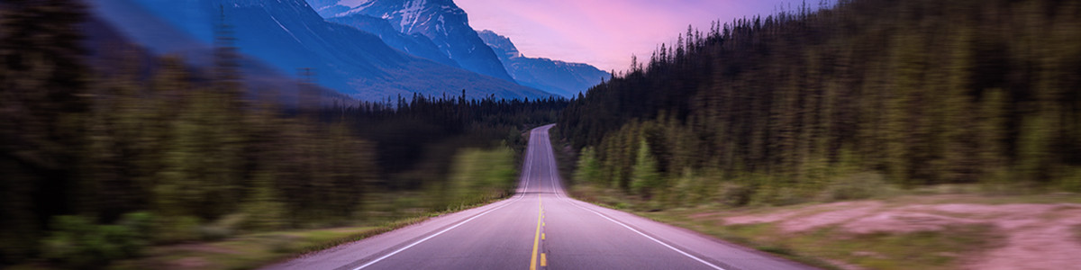 Scenic road in the Canadian Rockies while Sunset