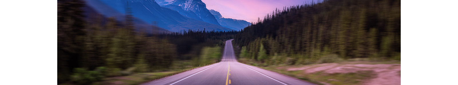 Scenic road in the Canadian Rockies while Sunset