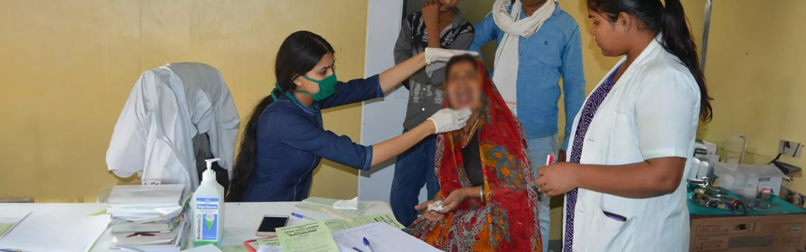 Doctor checking a woman