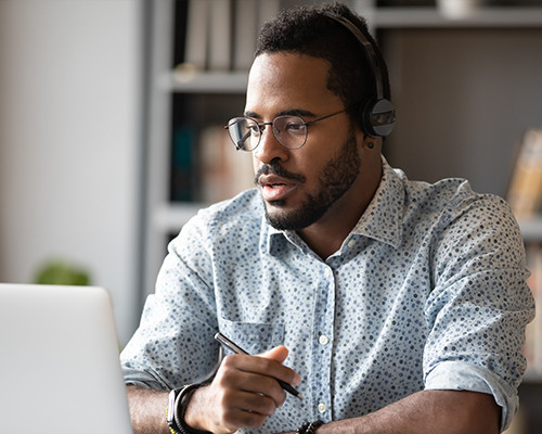 Man looking at laptop