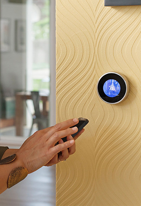 a person using smart home automation device