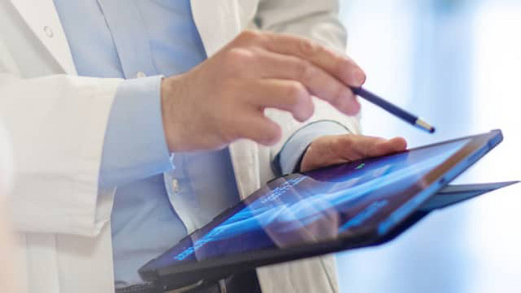 close-up of a tablet with scans