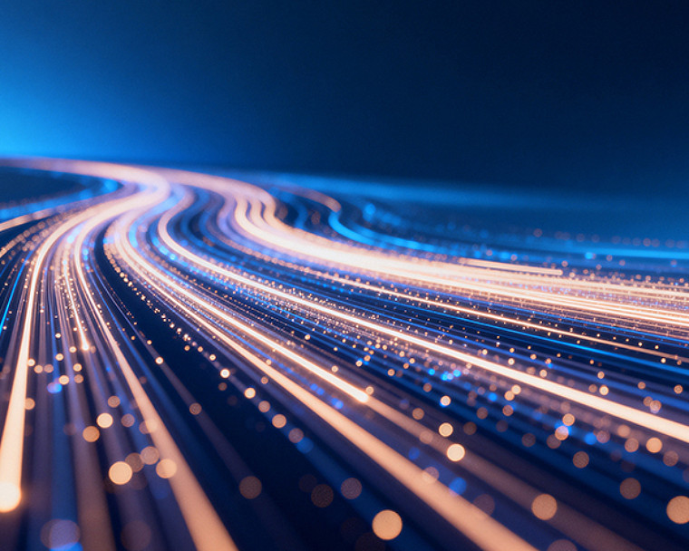 Glowing blue and gold data streams curving across dark background.