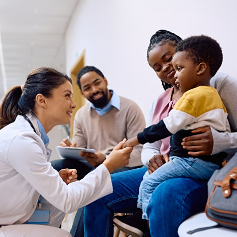 health professional interacting with a child