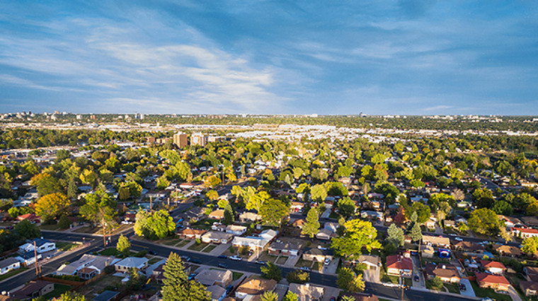 Aerial view of a suburban neighborhood with houses and trees
