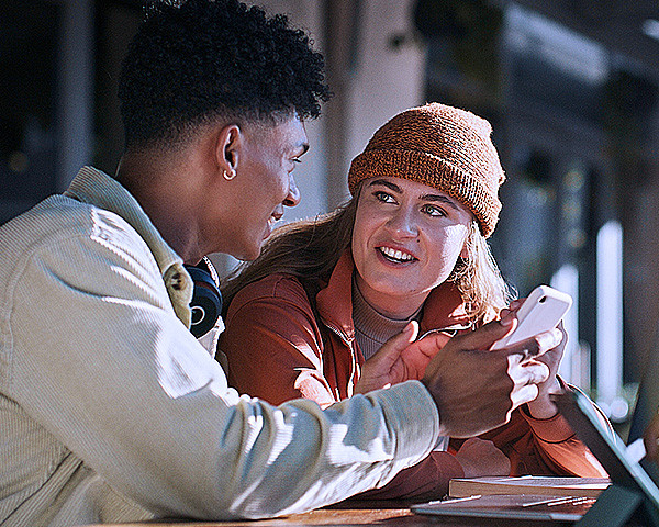 A couple engaging in mobile
