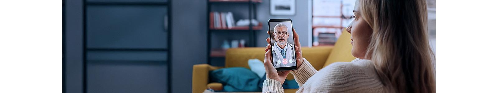 A woman consulting doctor through her mobile