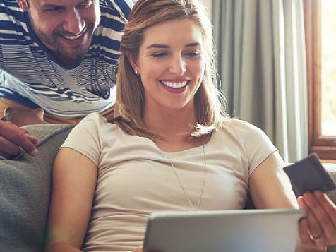 couple looking at laptop