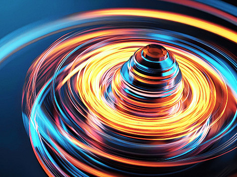A spinning, brightly lit top-like object