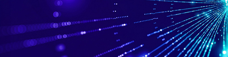 Abstract blue and purple digital light streaks radiating outward