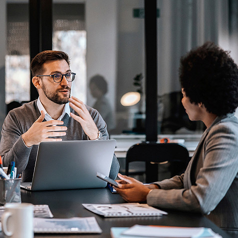 Two employees in a discussion