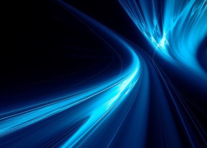 Abstract image of blue waves against a black background