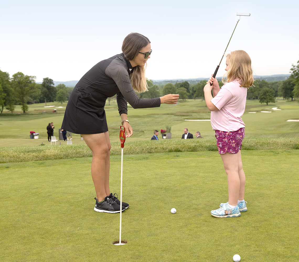 golfer teaching to play