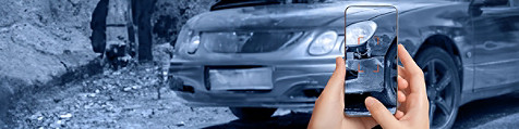 someone taking photo from car with mobile phone