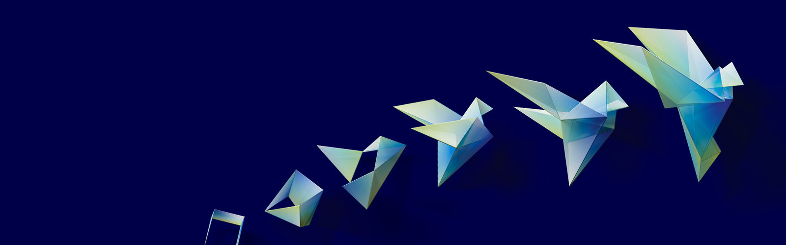 A collection of colorful origami paper birds displayed against a vibrant blue background.