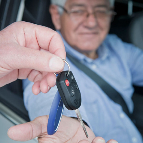 handing over car keys to someone