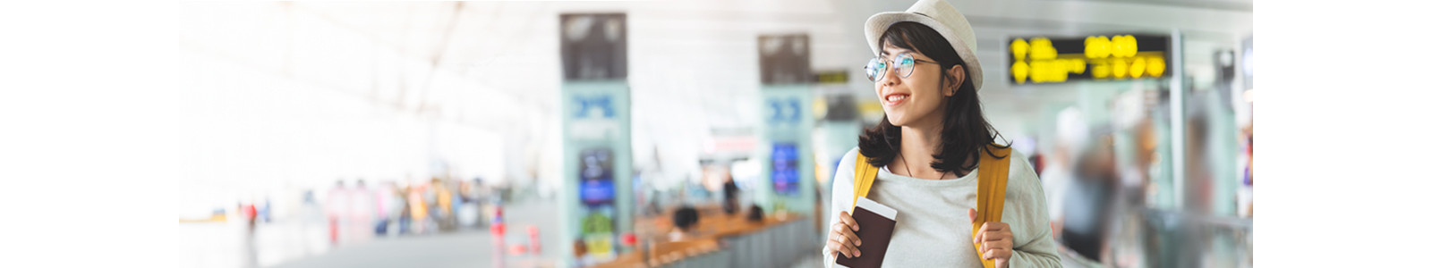 A traveller holding a passport