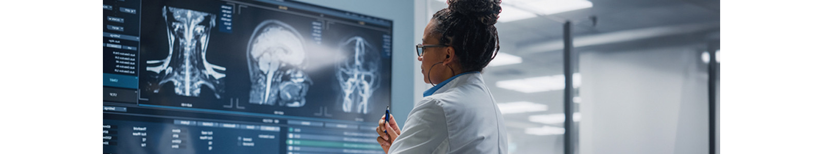 A lady doctor observing x-rays