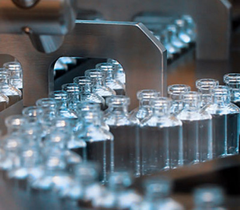 Medicine bottles in assembly line