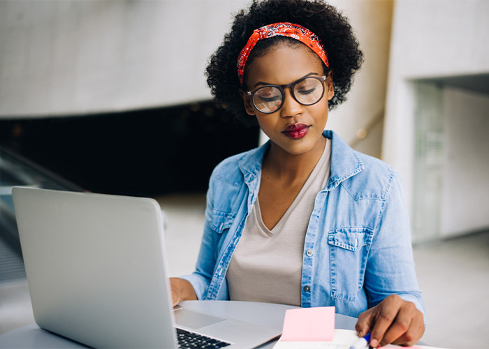 a female entrepreneur working on her business