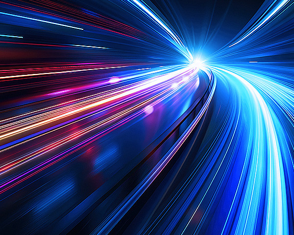 A neon light ray trails on dark background