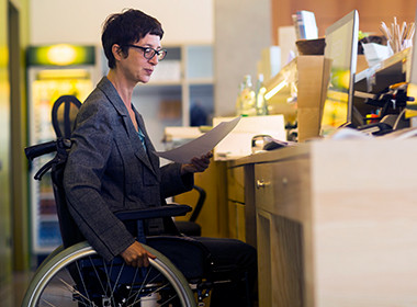 differently-abled lady working in the office