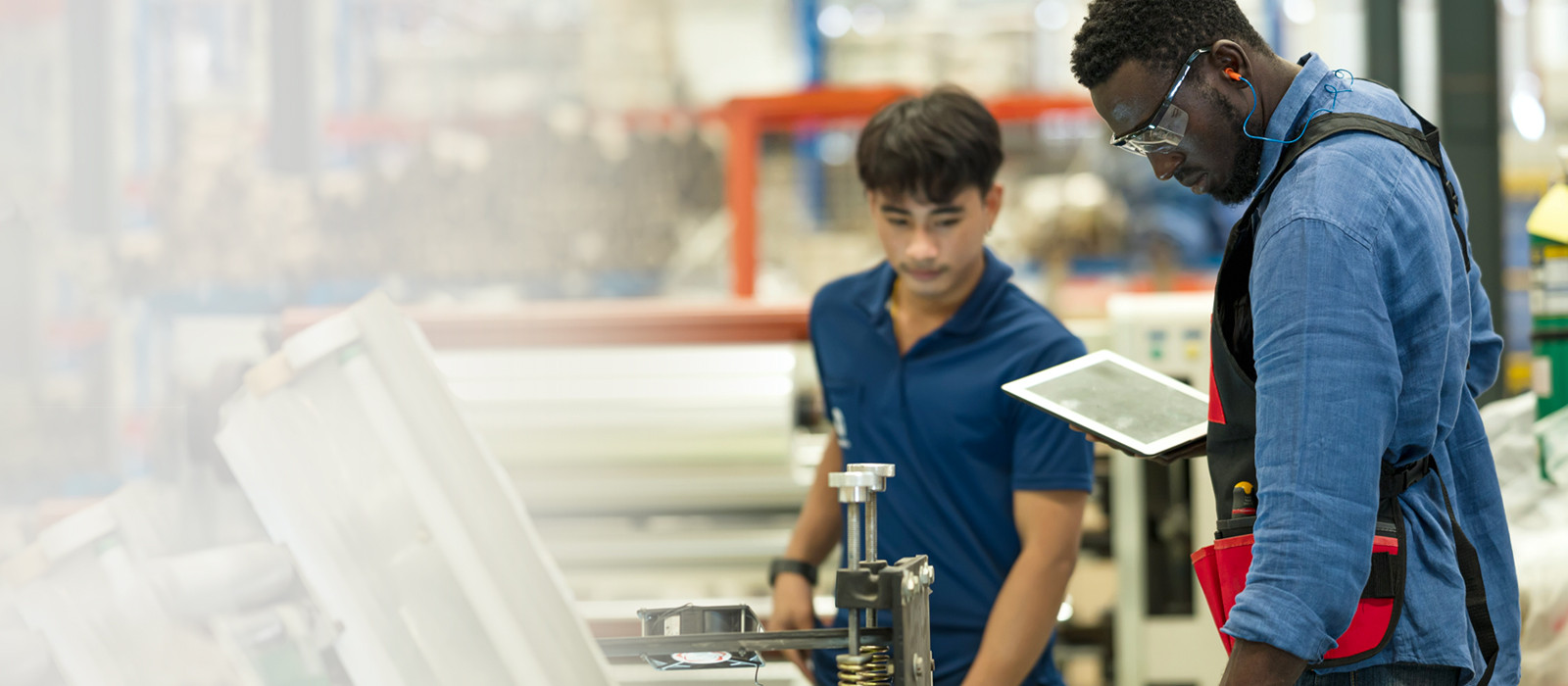 Workers using a tablet