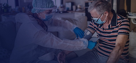 An elderly man getting vaccinated