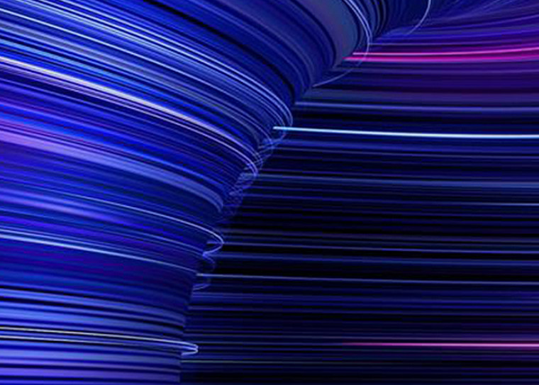 Abstract flowing light streaks in blue and purple tones