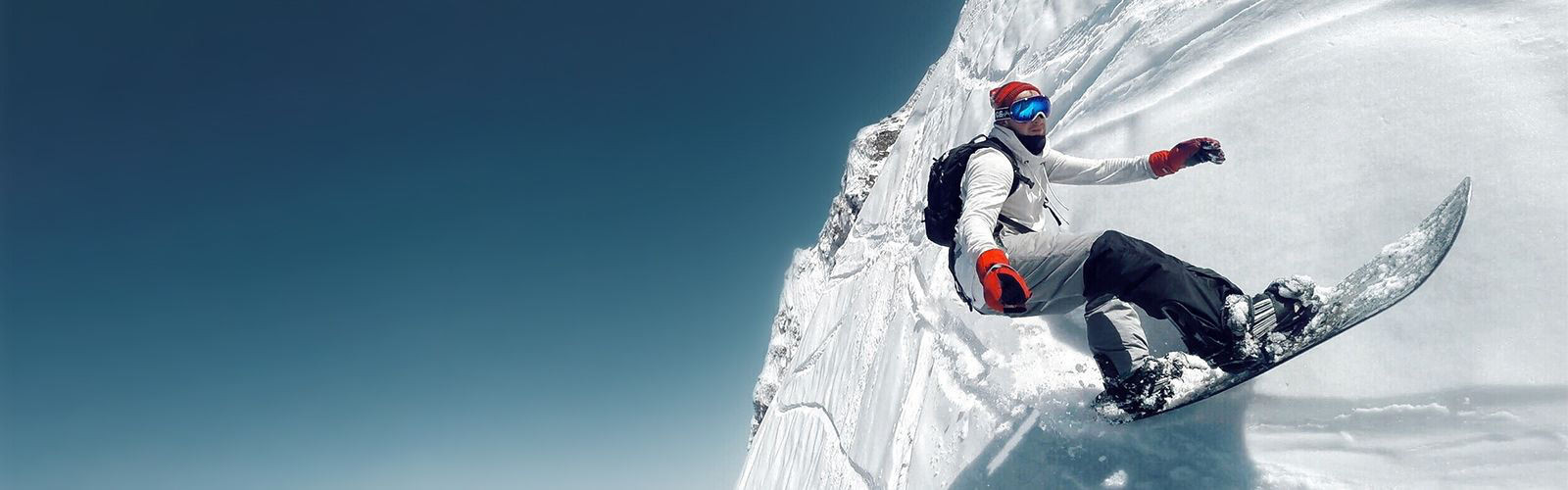 man sliding on the snow mountain