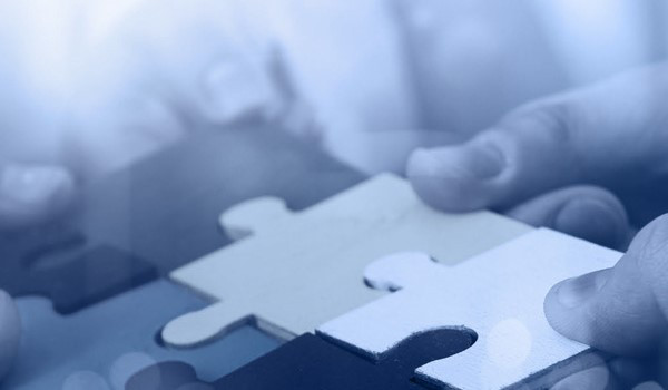 Closeup view of a few jigsaw puzzle pieces
