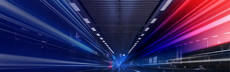 A tunnel-like structure with fast moving vehicle lights