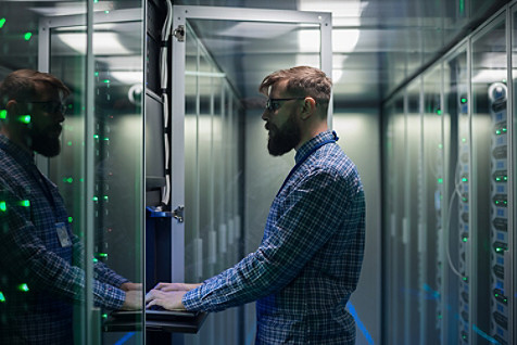 man standing in a server room